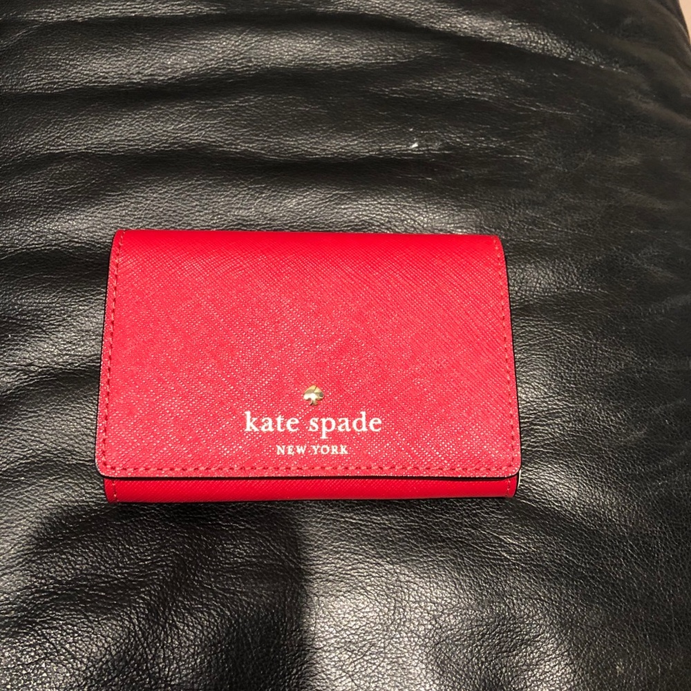 Red Kate Spade Wallet - never been used.